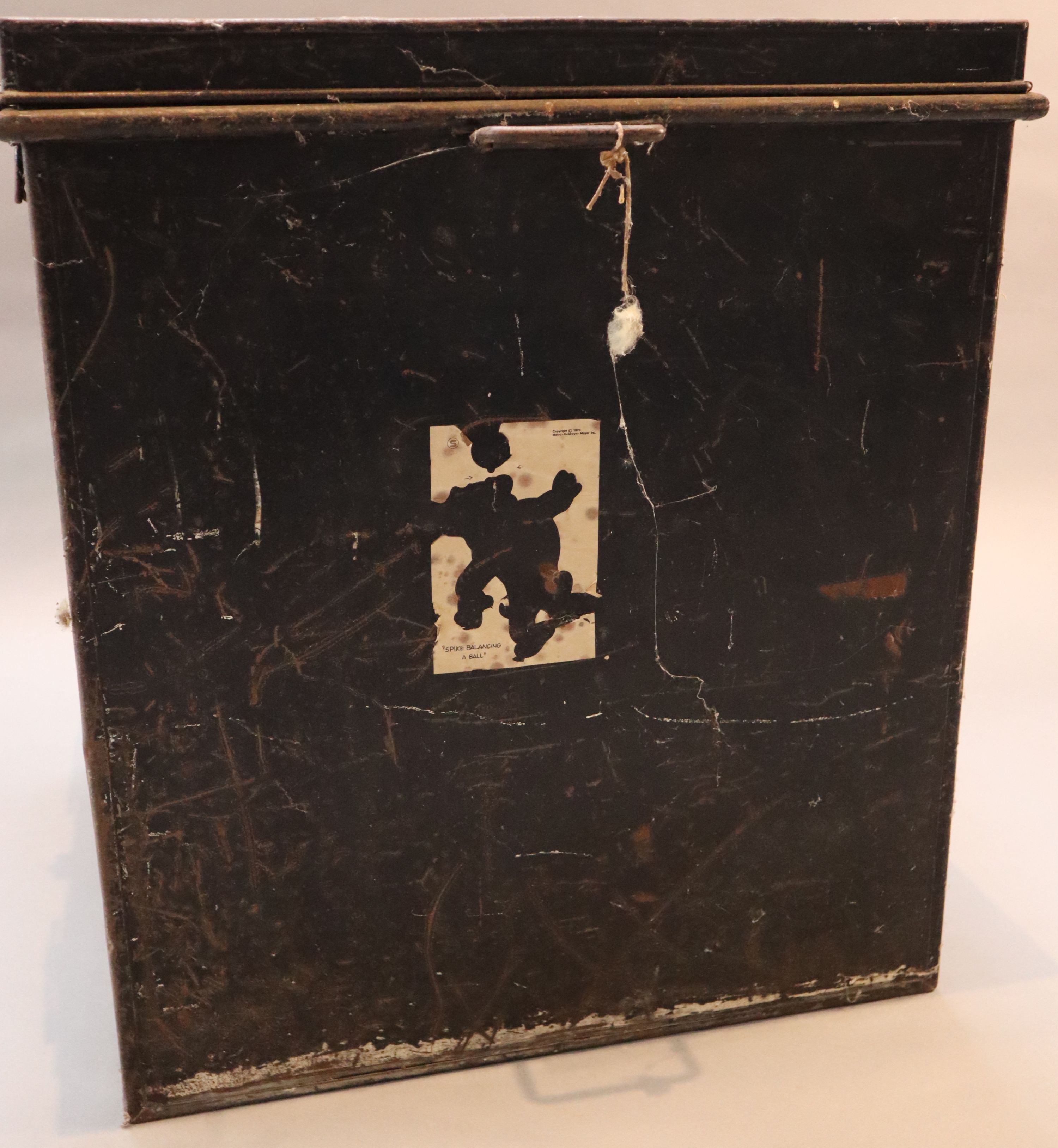 An early 20th century black painted tin travelling trunk, inscribed Lady Brabourne with old British India and Cooks Travel labels, wi